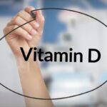 osoba piše vitamin d